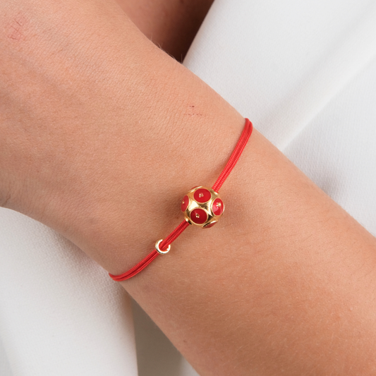 Bracelet Viana's Conta Red in Gold Plated Silver with Cord styled on model - Gold jewelry