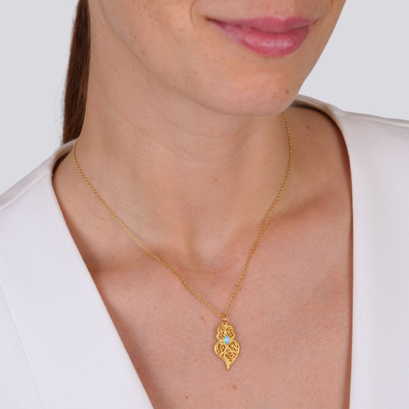 Necklace Heart of Viana Turquoise Blue in Gold Plated Silver styled on model