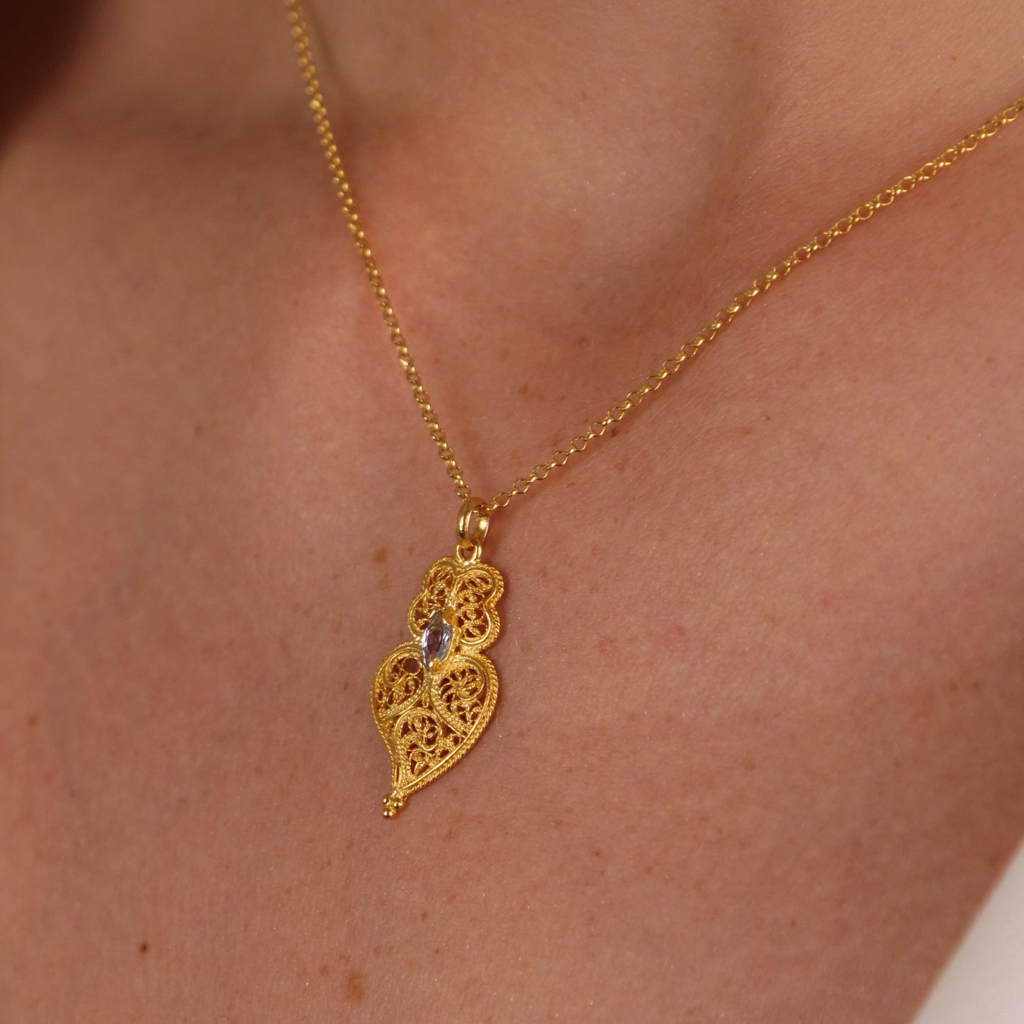 Necklace Heart of Viana Aqua Blue in Gold Plated Silver styled on model