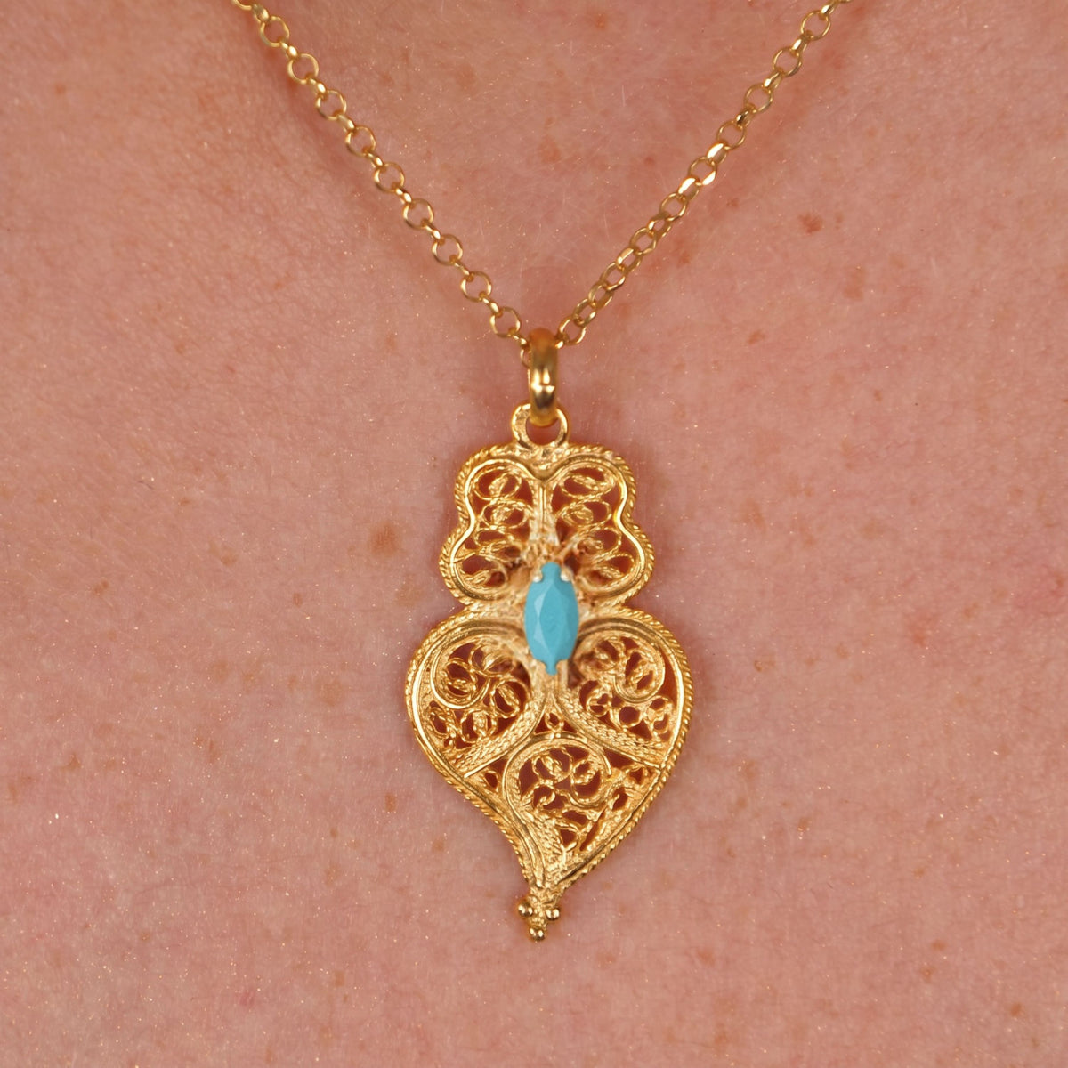 Necklace Heart of Viana Turquoise Blue in Gold Plated Silver worn by model